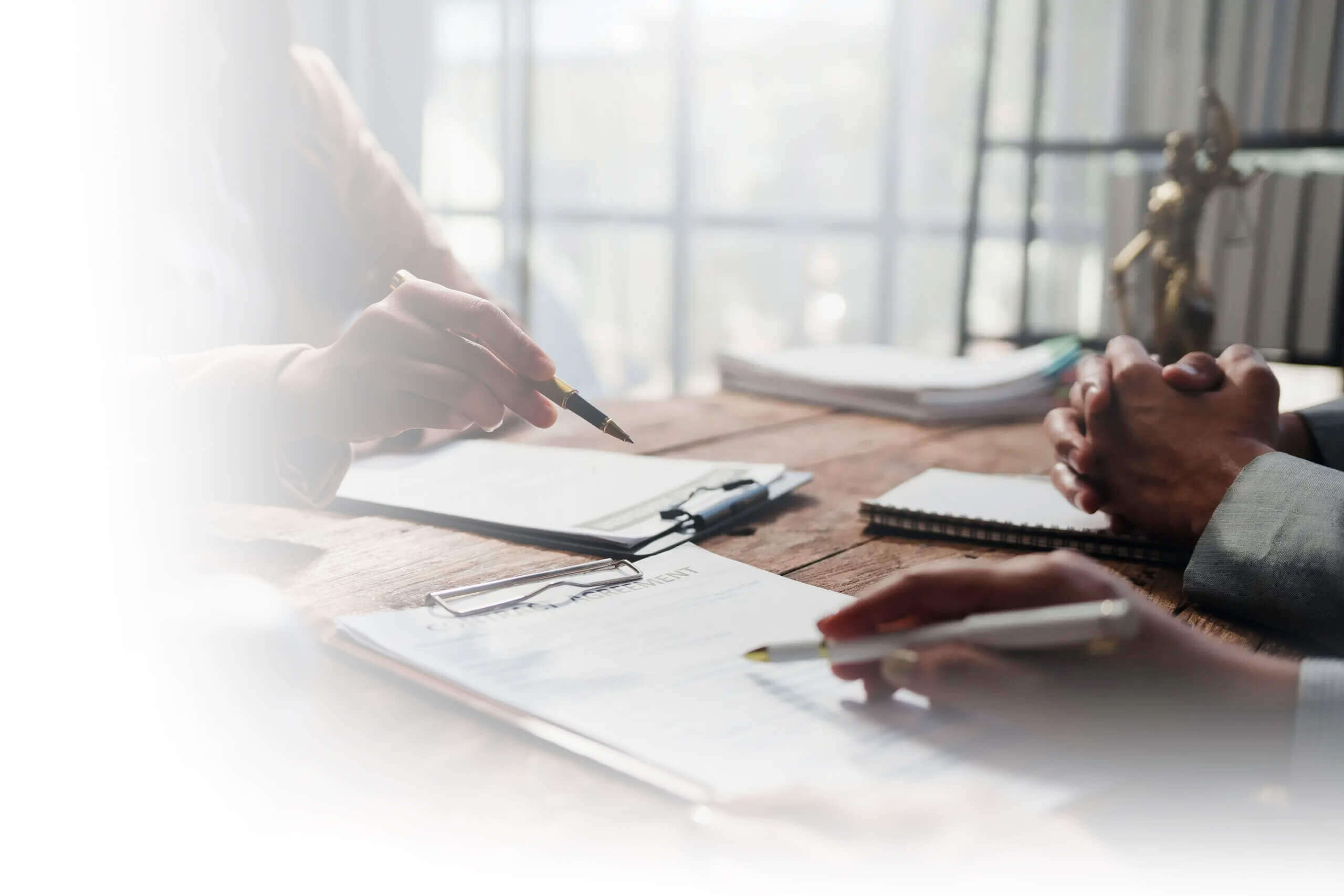 Lawyer and client discuss contracts in international business and tax law USA Germany